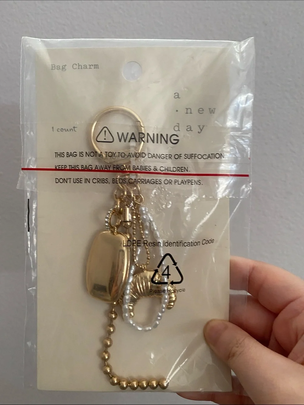 a new day Gold and Pearl Accent Bag Charm Keyring